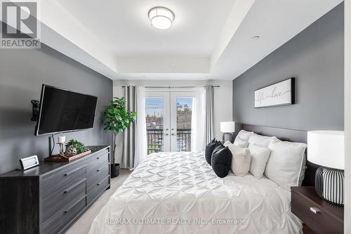 11 - 100 Coxwell Avenue, Toronto, ON - Indoor Photo Showing Bedroom