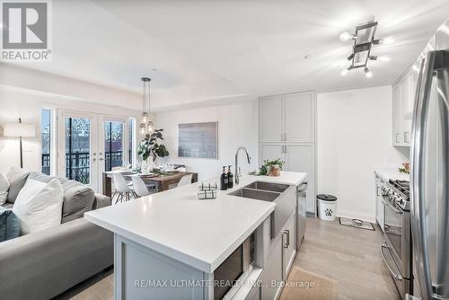 11 - 100 Coxwell Avenue, Toronto, ON - Indoor Photo Showing Kitchen With Double Sink With Upgraded Kitchen