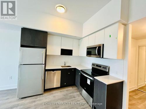 204 - 202 Burnhamthorpe Road E, Mississauga, ON - Indoor Photo Showing Kitchen With Stainless Steel Kitchen