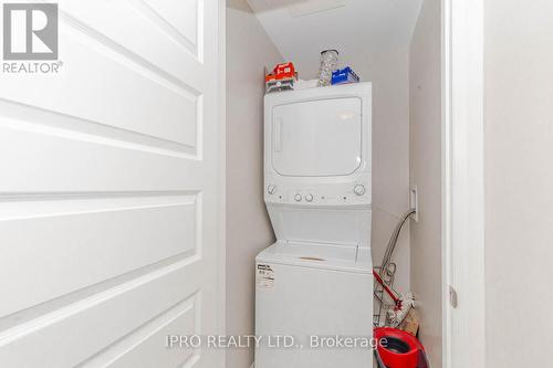 318 - 128 Grovewood Common, Oakville, ON - Indoor Photo Showing Laundry Room