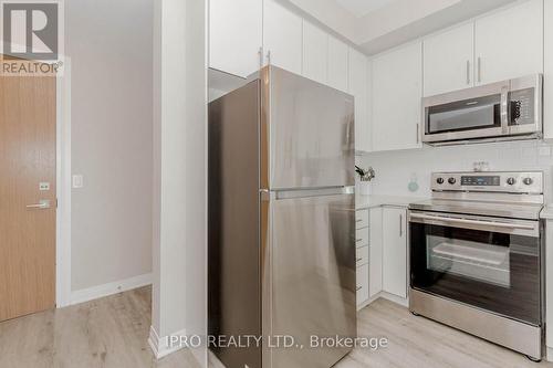 318 - 128 Grovewood Common, Oakville, ON - Indoor Photo Showing Kitchen