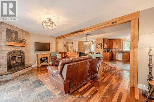 8071 4Th Line, Essa, ON - Indoor Photo Showing Living Room With Fireplace