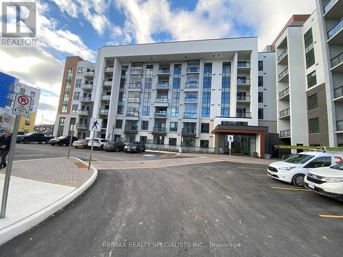 407 - 460 Gordon Krantz Avenue, Milton, ON - Outdoor With Balcony With Facade