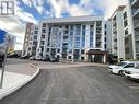 407 - 460 Gordon Krantz Avenue, Milton, ON  - Outdoor With Balcony With Facade 