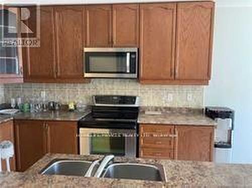 21 Saint Eugene Street, Brampton, ON - Indoor Photo Showing Kitchen With Double Sink