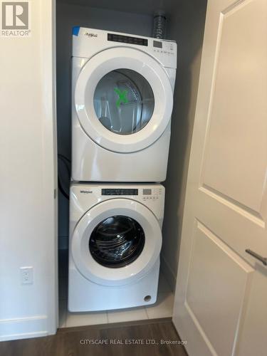 704 - 204 Burnhamthorpe Road E, Mississauga, ON - Indoor Photo Showing Laundry Room