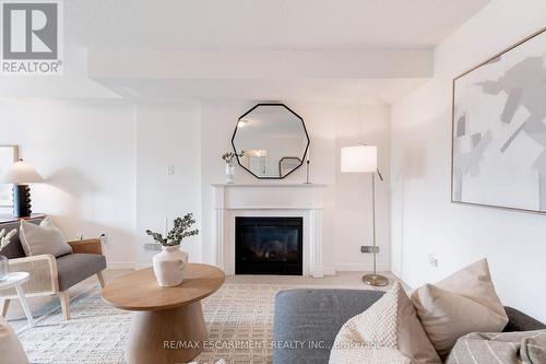 30 - 4241 Sarazen Drive, Burlington, ON - Indoor Photo Showing Living Room With Fireplace