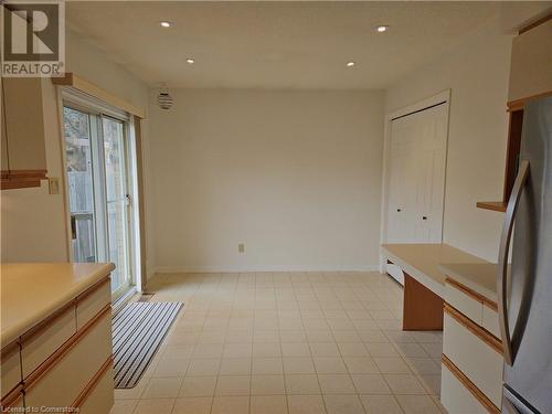 Kitchen featuring stainless steel refrigerator - 551 Hallmark Drive, Waterloo, ON - Indoor