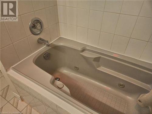 Bathroom with a relaxing tiled tub - 551 Hallmark Drive, Waterloo, ON - Indoor Photo Showing Bathroom