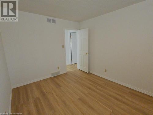 Spare room featuring light hardwood / wood-style floors - 551 Hallmark Drive, Waterloo, ON - Indoor Photo Showing Other Room