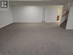 Unfurnished room with carpet flooring - 