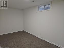 Unfurnished room with carpet floors - 