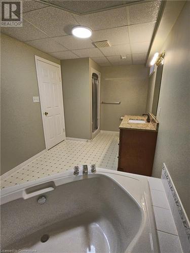 Bathroom with a drop ceiling and vanity - 551 Hallmark Drive, Waterloo, ON - Indoor Photo Showing Laundry Room