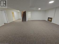 Basement featuring carpet floors - 