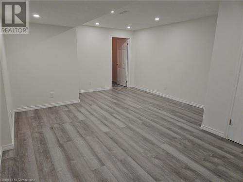 Unfurnished room featuring light hardwood / wood-style flooring - 551 Hallmark Drive, Waterloo, ON - Indoor Photo Showing Other Room