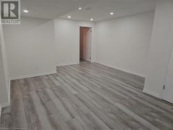 Unfurnished room featuring light hardwood / wood-style flooring - 