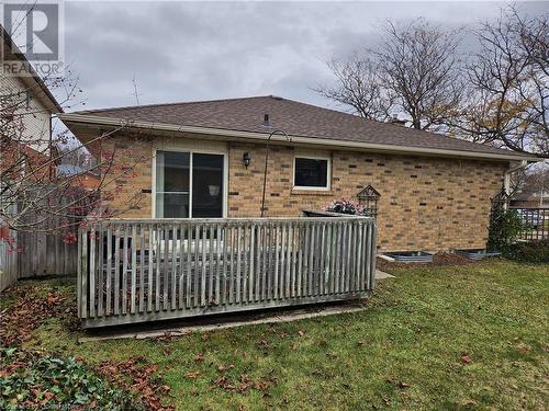 Rear view of house featuring a yard - 551 Hallmark Drive, Waterloo, ON - Outdoor