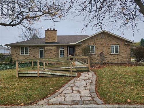 Rear view of property with a deck and a yard - 551 Hallmark Drive, Waterloo, ON - Outdoor With Deck Patio Veranda