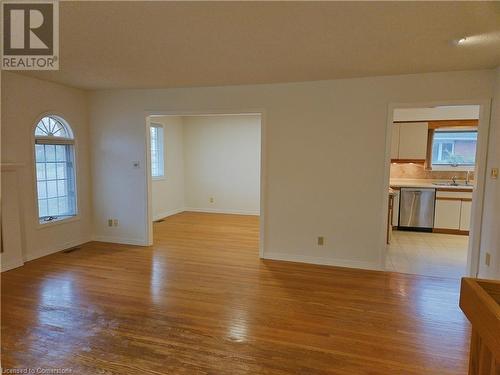 Unfurnished room with sink and light wood-type flooring - 551 Hallmark Drive, Waterloo, ON - Indoor