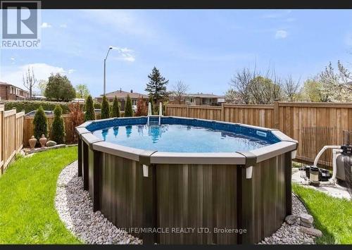 7420 Netherwood Road, Mississauga, ON - Outdoor With Above Ground Pool With Backyard