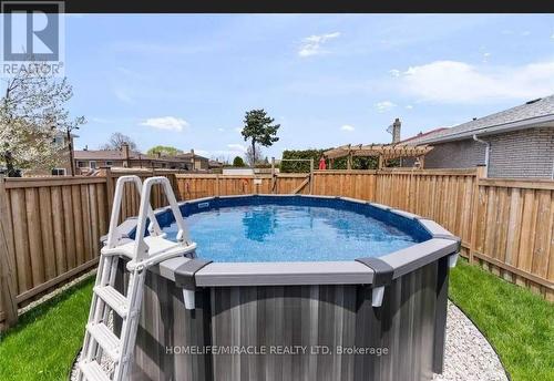 7420 Netherwood Road, Mississauga, ON - Outdoor With Above Ground Pool With Backyard