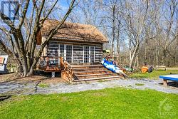 Log cabin/store for rental of canoes, kayaks and Corcls - 