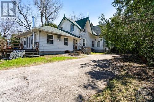 Side view of residential home that has two rental units - 21 Craig Street, Perth, ON 