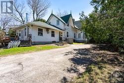 Side view of residential home that currently has two rental units - 