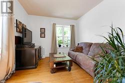 Front rental unit living room - 