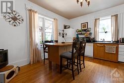 Front rental unit eat-in kitchen - 