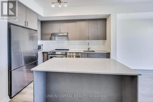 1409 - 9000 Jane Street, Vaughan, ON - Indoor Photo Showing Kitchen With Upgraded Kitchen