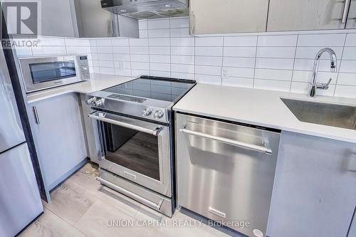 1409 - 9000 Jane Street, Vaughan, ON - Indoor Photo Showing Kitchen With Upgraded Kitchen