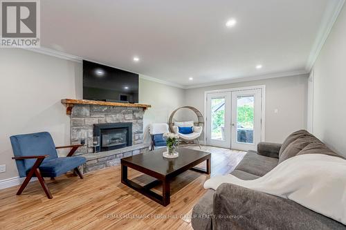 5 Glendale Avenue, Essa, ON - Indoor Photo Showing Living Room With Fireplace