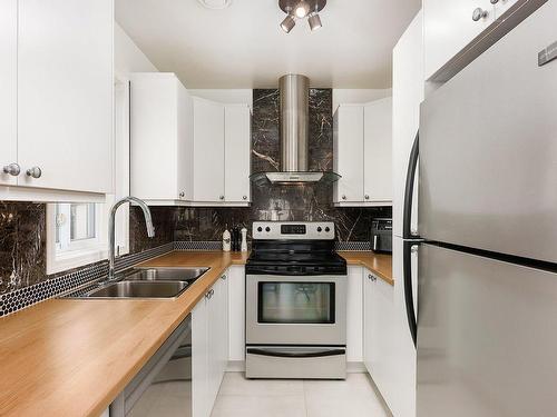 Kitchen - 172 57E Avenue, Pointe-Calumet, QC - Indoor Photo Showing Kitchen With Double Sink