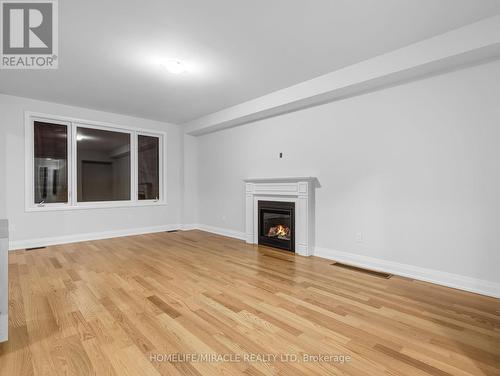 925 Knights Lane, Woodstock, ON - Indoor Photo Showing Living Room With Fireplace