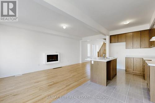 1012 Crownest Hollow, Pickering, ON - Indoor Photo Showing Kitchen With Fireplace