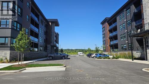 216 - 118 Summersides Boulevard, Pelham, ON - Outdoor With Balcony With Facade