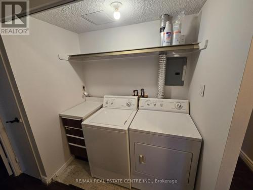 903 - 820 Burnhamthorpe Road, Toronto, ON - Indoor Photo Showing Laundry Room