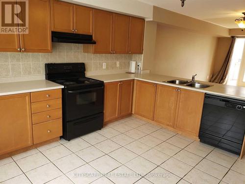 111 - 4950 Winston Churchill Boulevard, Mississauga, ON - Indoor Photo Showing Kitchen With Double Sink