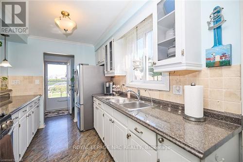 104 Carriage Road, St. Catharines, ON - Indoor Photo Showing Kitchen With Double Sink