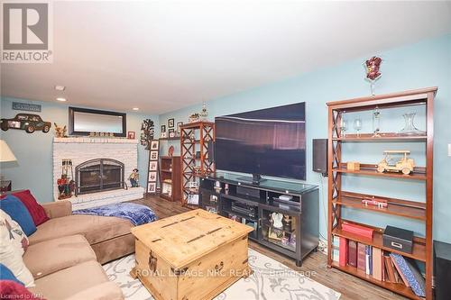 104 Carriage Road, St. Catharines, ON - Indoor Photo Showing Living Room With Fireplace