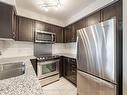 317-60 Via Rosedale  N, Brampton, ON  - Indoor Photo Showing Kitchen With Double Sink 