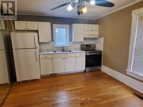 1 - 8935 Mississauga Road, Brampton, ON - Indoor Photo Showing Kitchen With Double Sink