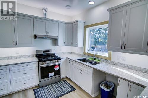 108 Central Avenue, Love, SK - Indoor Photo Showing Kitchen With Double Sink