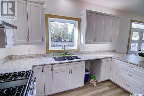 108 Central Avenue, Love, SK - Indoor Photo Showing Kitchen With Double Sink