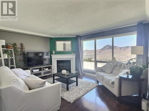 2526 Nechako Drive Unit# 1, Kamloops, BC - Indoor Photo Showing Living Room With Fireplace