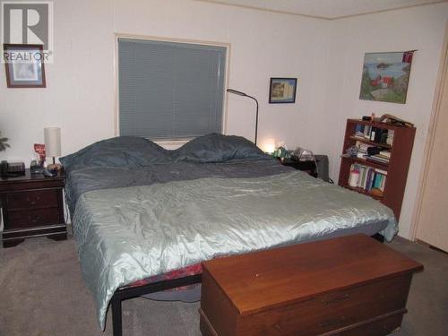 4776 Moneeyaw Road, 108 Mile Ranch, BC - Indoor Photo Showing Bedroom