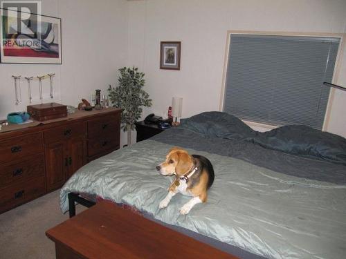 4776 Moneeyaw Road, 108 Mile Ranch, BC - Indoor Photo Showing Bedroom