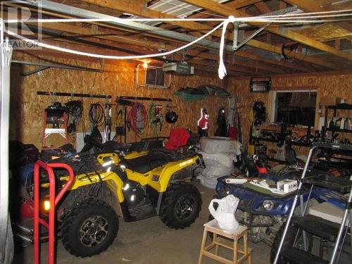 4776 Moneeyaw Road, 108 Mile Ranch, BC - Indoor Photo Showing Garage