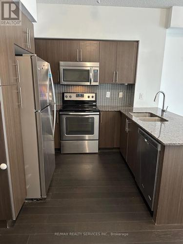 1607 - 65 Speers Road, Oakville, ON - Indoor Photo Showing Kitchen With Upgraded Kitchen